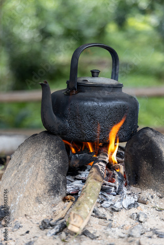Traditional kettle over open camp fire