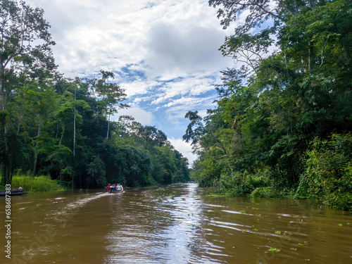 Canoe tour, going down amazon river in Peru