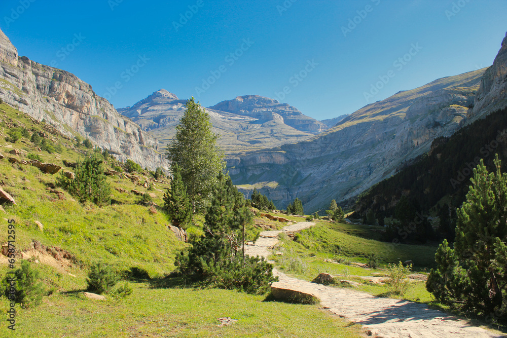 Ordesa Valley. Ordesa National Park. This valley is located in the central Pyrenees of Huesca, Sobrarbe region, Aragon. It is listed as a World Heritage Site by UNESCO. In the background, against the