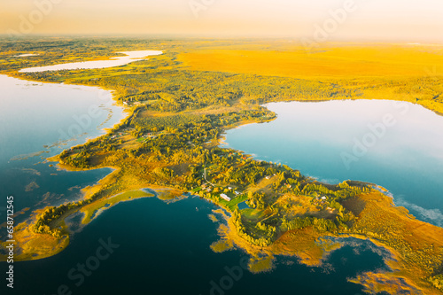 Fototapeta Naklejka Na Ścianę i Meble -  Braslaw District, Vitebsk Voblast, Belarus. Aerial View Of Lakes, Green Forest Landscape. Top View Of Beautiful European Nature From High Attitude. Bird's Eye View. Famous Lakes.