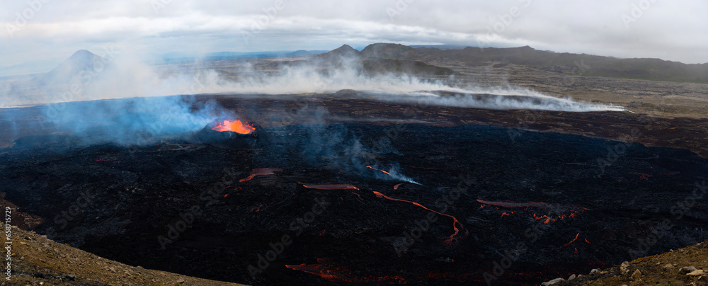 Fototapeta premium Panoramic of volcano near Reykjavik. Iceland 2023. Lava flow. Icelandic landscape. Global warming concept