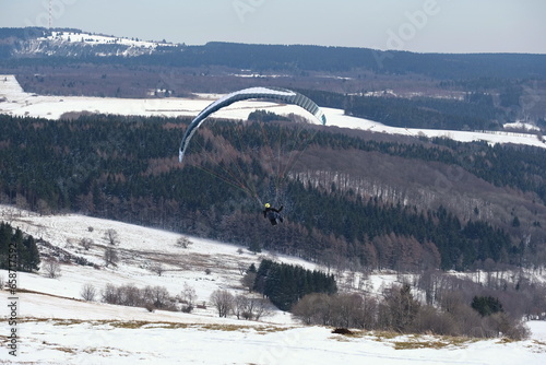 Paragliding im Winter auf der Wasserkuppe photo