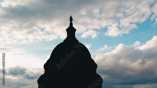 US Capitol dome with a cloudy sky in a sunny day