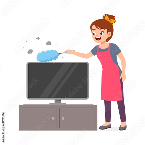 young woman cleaning dust from top of television