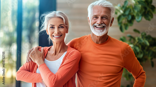 mature couple relaxed with tracksuit orange for active exercise. Senior couple with outfit for training sport fitness home. Generative Ai