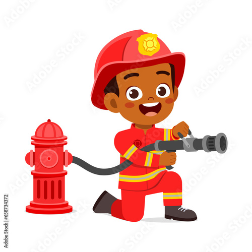 little kid waring fire fighter costume