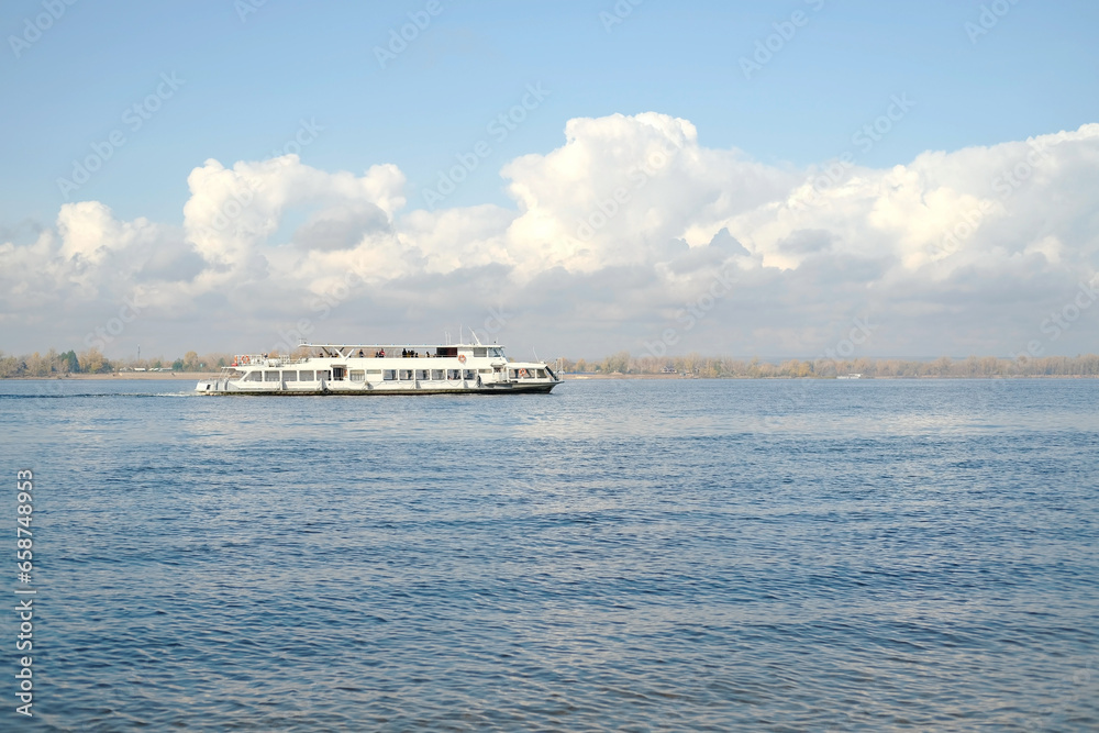 Panorama of the cruise ship moving on the river of Volga towards Samara city in Russia.