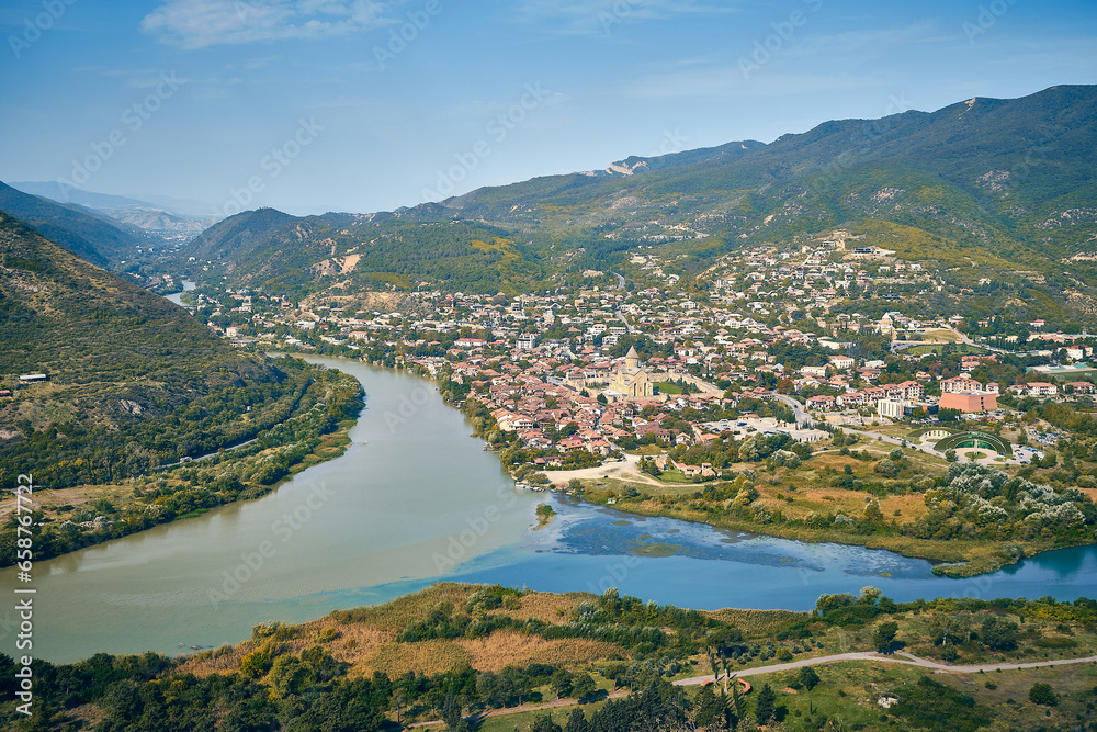 Panoramic view of the Aragvi and Kura rivers confluence and Mtskheta city seen from Jvari monastery