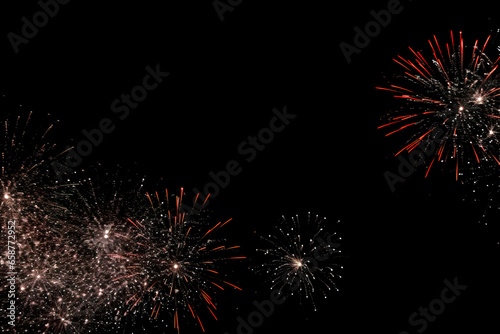 fireworks in black sky against dark background, dark emerald and light amber, decorative backgrounds, with empty copy space