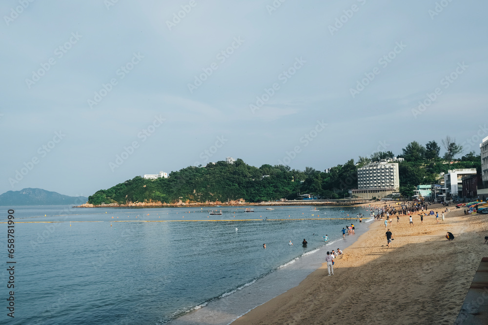 tourists in the beach, Cheung Chau island, Hong Kong, summer 2023 tourists in the beach, Cheung Chau island, Hong Kong, summer 2023