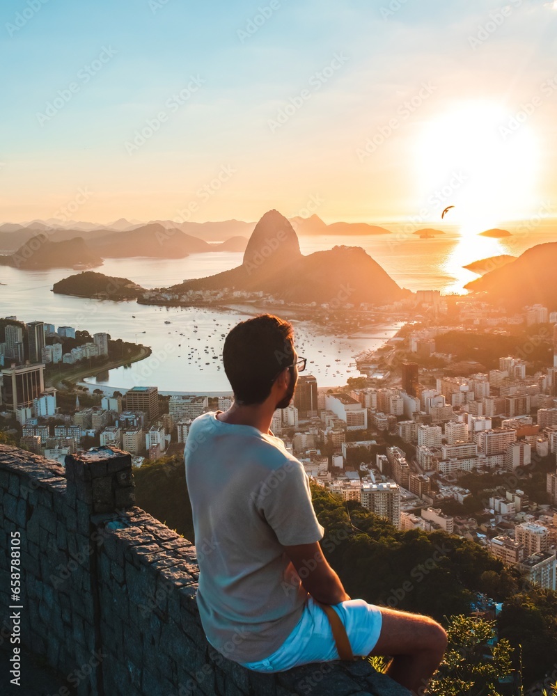 tourist watching the sunrise in rio de janeiro brazil	 - obrazy, fototapety, plakaty 