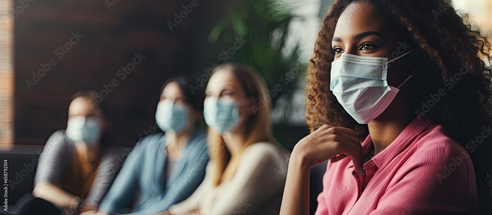 African American woman in group therapy discussing with face masks amid the COVID 19 outbreak With copyspace for text