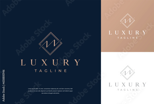 m letter calligraphy minimal monogram emblem style vector logo. Gold color and black background.
