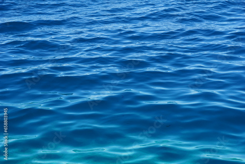 Seawater surface with small waves and gradient colors
