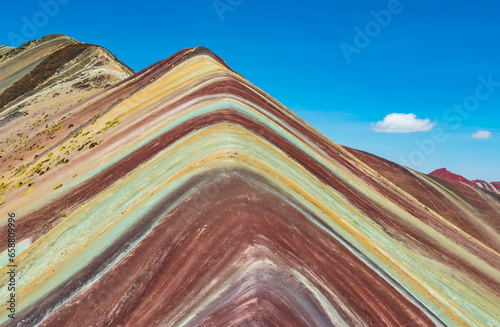 Gorgeous vivid colors of Vinicunca, the majestic rainbow mountain located in Cusco region, Peru © SimoneGilioli