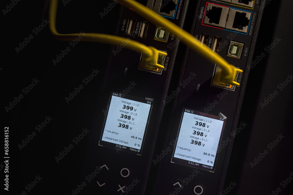 cables connected to a voltage monitoring device in the