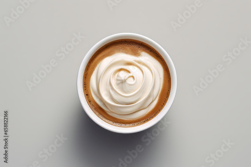 top down view of cream in a single coffee cup photo
