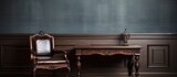 Vintage table and armchair in classical Italian style interior Dark wood furniture on light walls and floor Ideal for relaxation With copyspace for text