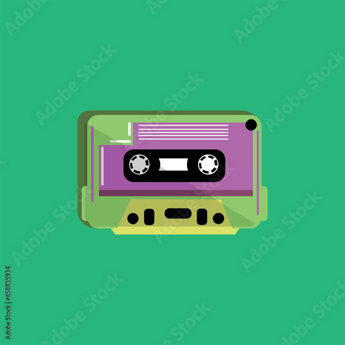 Audio cassette on green background