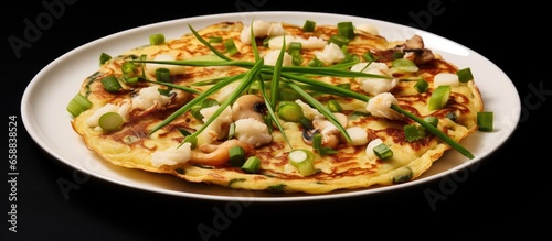 Famous Korean food Haemul pajeon a pancake with seafood and green onion With copyspace for text