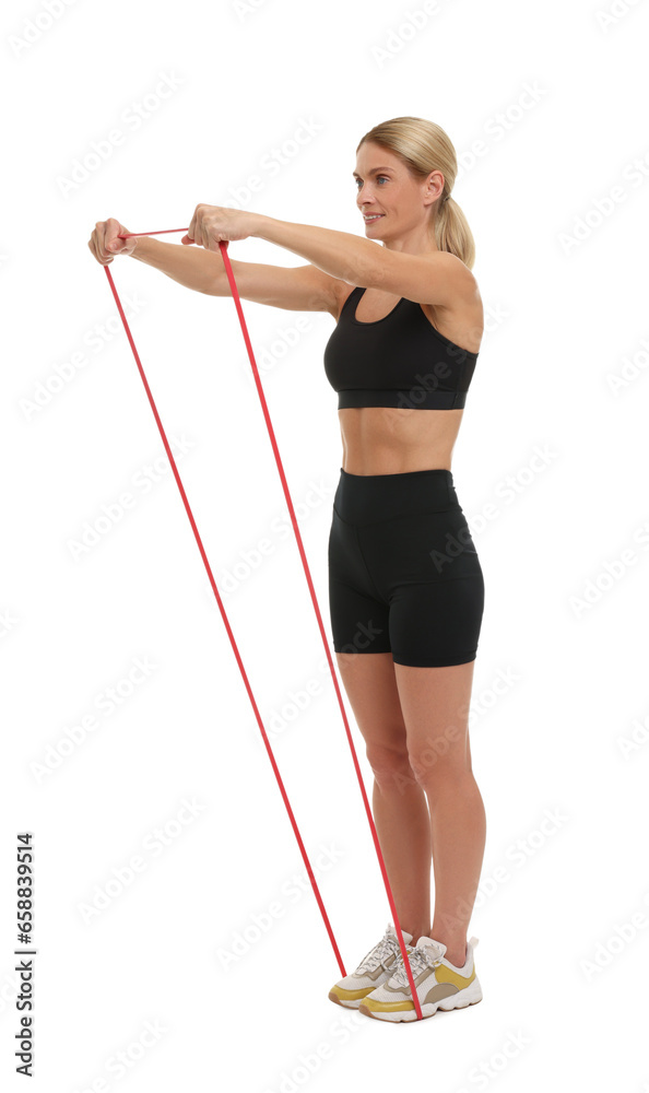 Woman exercising with elastic resistance band on white background