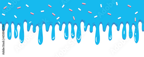 Dripping blue cream with sprinkles on white background