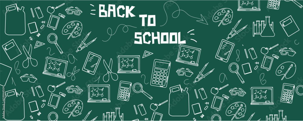 Many different drawings and text BACK TO SCHOOL on green chalkboard