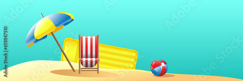 Deck chair, inflatable mattress, umbrella and ball on sea beach