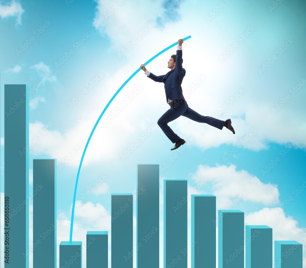 Businessman vault jumping over bar charts Businessman vault jumping over bar charts