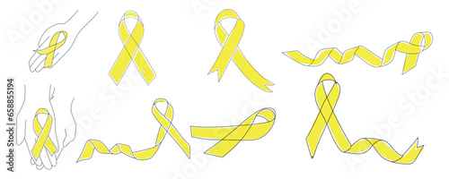 Set of golden ribbons on white background. Childhood cancer awareness concept