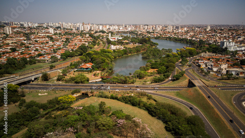 al view of the Rio Preto municipal dam in drone panorama, aerial view on a sunny day with the avenues and highways and the park and the river in high resolution - Sao Jose do Rio Preto - Sao Paulo