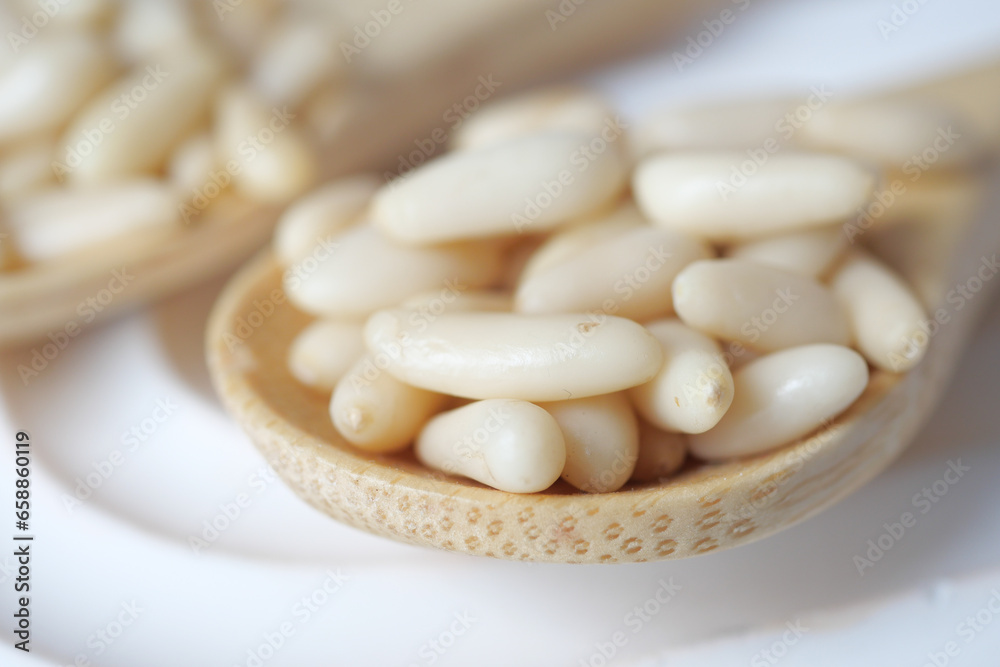 Healthy pine nuts isolated on white background. Healthy pine nuts isolated on white background.