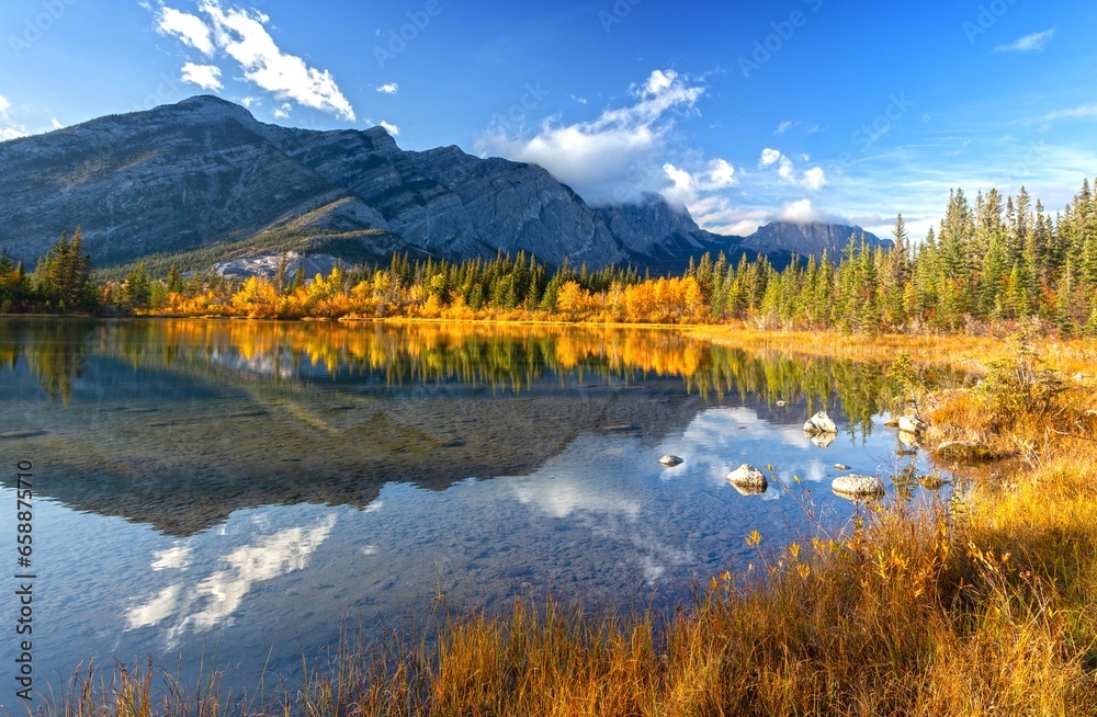 Scenic Autumn Colours Landscape, Tree Lined Many Springs Lake, Bow Valley Provincial Park, Alberta Foothills Canadian Rocky Mountains Panorama - obrazy, fototapety, plakaty 
