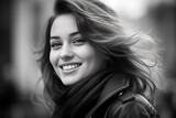 Beauty, make-up, lifestyles concept. Beautiful and happy young woman close-up outdoor portrait. Long hair brunette model smiling and looking at camera. Black and white image. Generative AI