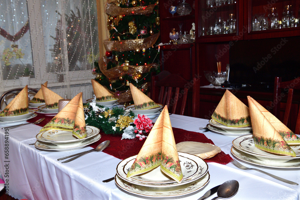 Christmas domesticity with a Christmas table and a decorated Christmas tree