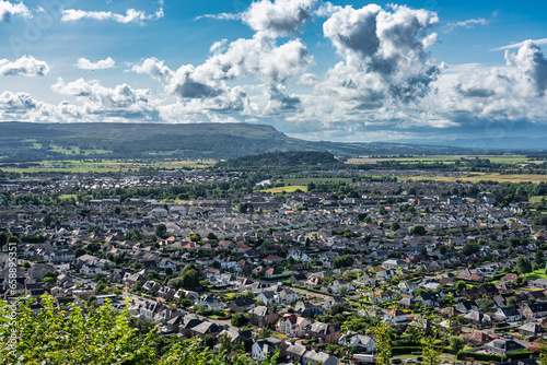 Aerial view of the city of Stirling at the foot of the hill of the William Wallace Monument, Scotland. photo