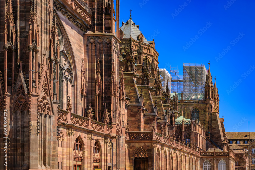 Obraz premium Ornate and intricate Gothic facade of the Notre Dame Cathedral in Strasbourg, France one of the most beautiful Gothic cathedrals in Europe