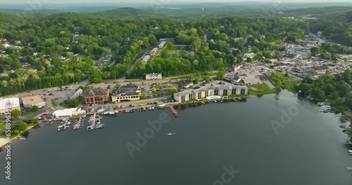 Late afternoon aerial video of Lake Mahopac located in Town of Carmel, Putnam County, New York.	