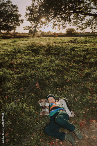 A boy having fun at the meadow, joy