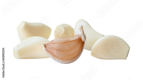 Front view of fresh garlic cloves in stack isolated on white background with clipping path in png file format. Close up photo