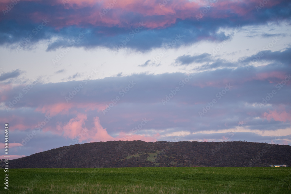 Pink Sky Dusk Setting over Farmers Land in Australia.
