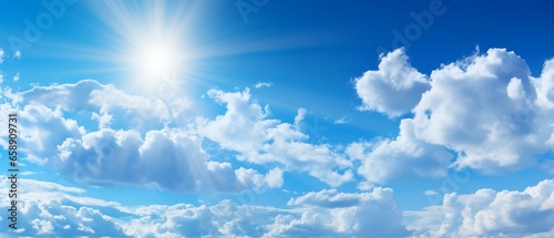 Vivid Panorama  Bright Blue Sky with White Clouds and Radiant Sun