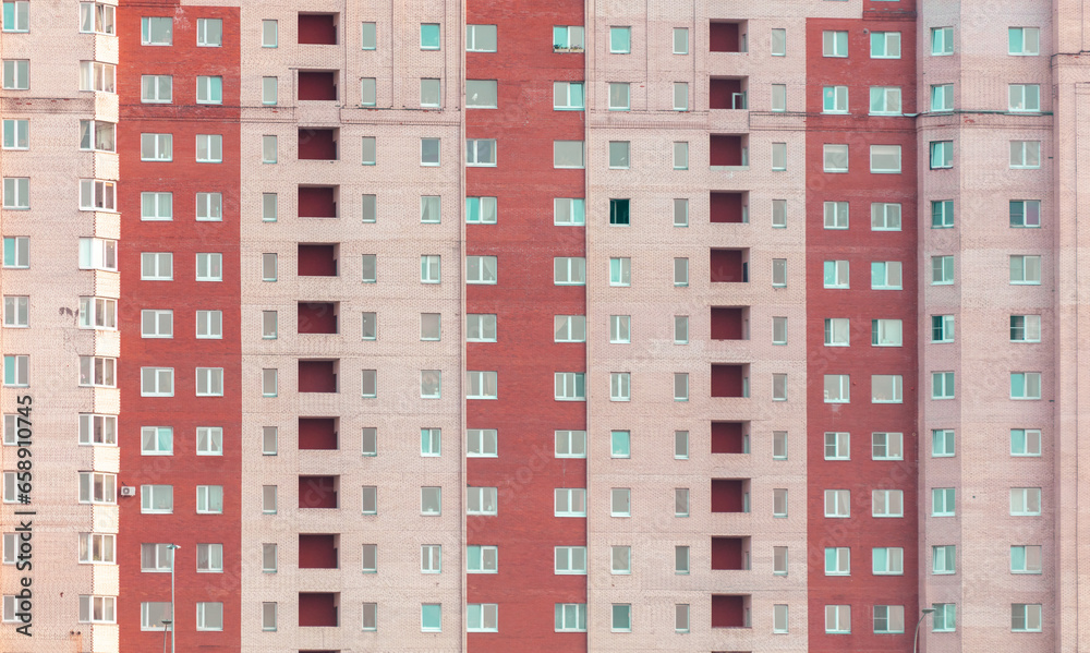 The walls of a multi-story building as a background. Texture The walls of a multi-story building as a background. Texture