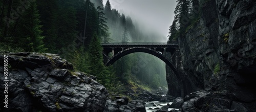 Abandoned bridge in Coquihalla Canyon British Columbia Canada With copyspace for text