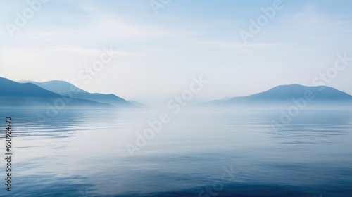 Tranquil Sea With Morning Fog Creating Ripples. Сoncept 1. Tranquil Sea 2. Morning Fog 3. Ripples 4. Calmness In Nature