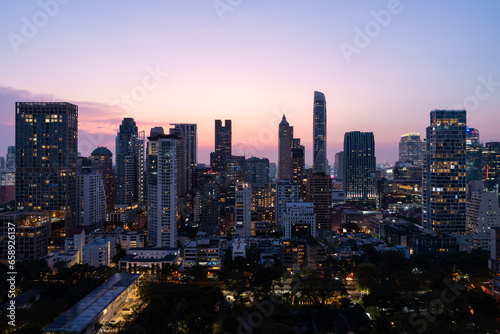 Bangkok city skyline with skyscrapers in evening