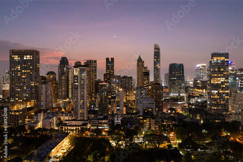 Beautiful panoramic view on night Bangkok skyline  office skyscrapers and lights