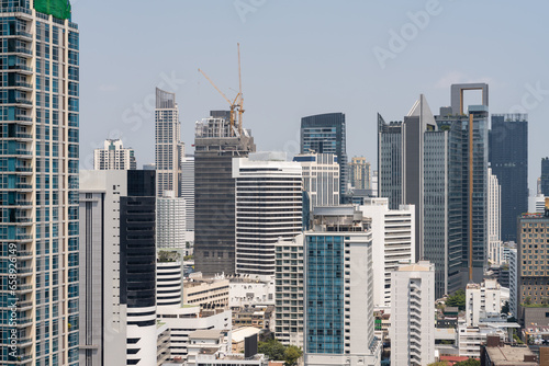 Cityscape of Bangkok, office buildings, towers and construction site