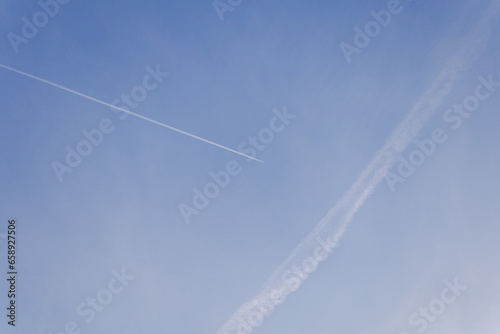Traces of airplanes in the sky © Tetiana Romaniuk