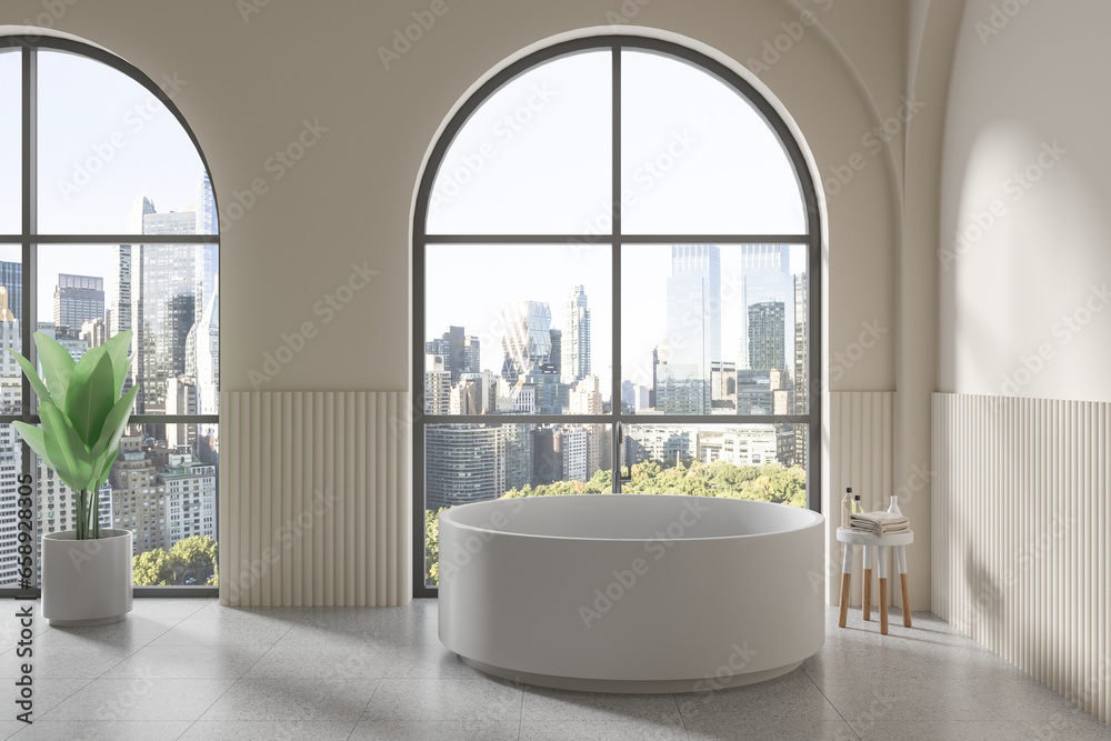Light home bathroom interior with tub, accessories and panoramic window Light home bathroom interior with tub, accessories and panoramic window